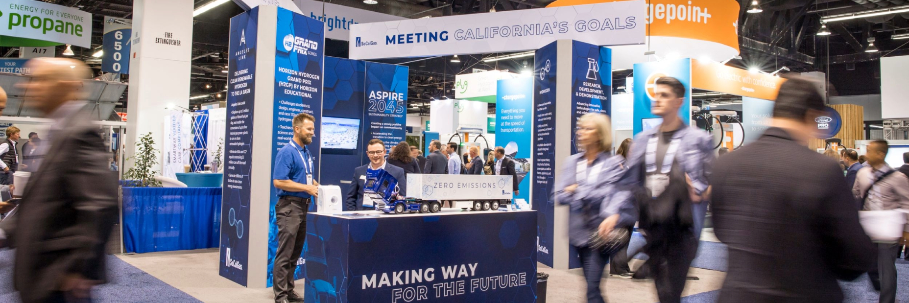 people viewing socalgas' booth at the act expo