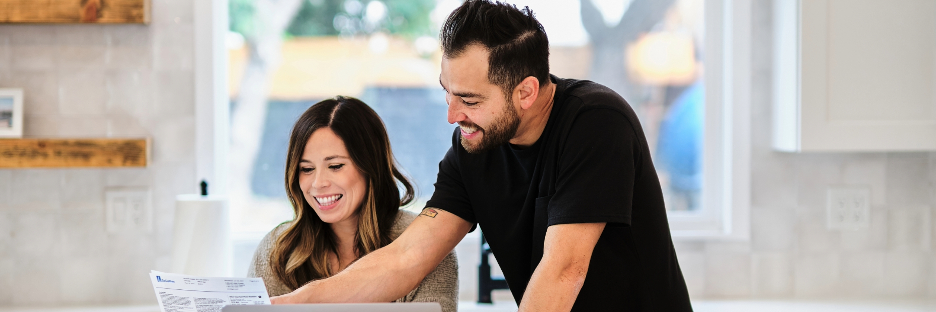 Couple Looking at a Bill