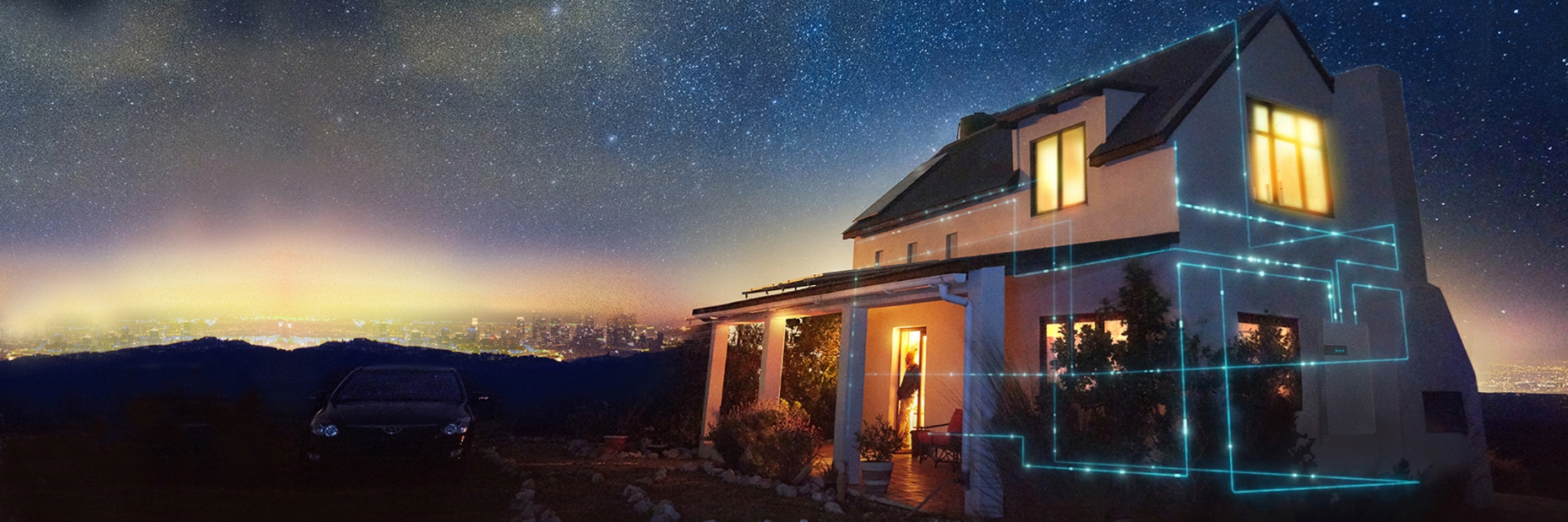 Image of blue laser pipes running through a house at dusk