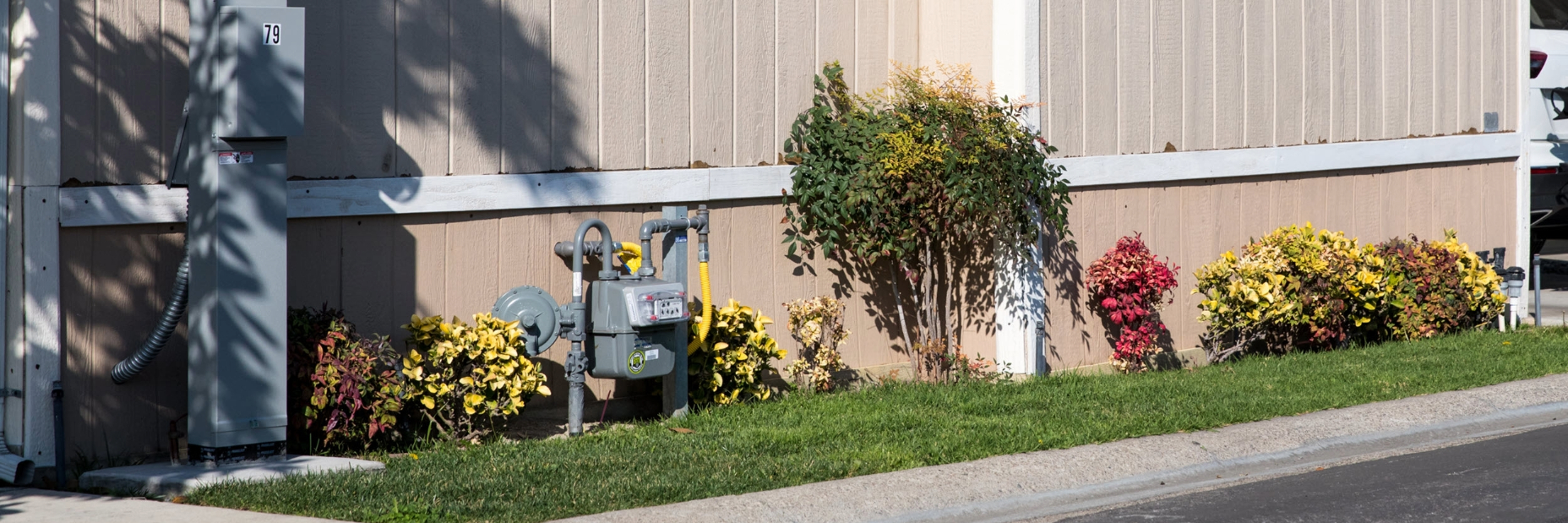 Side of a mobile home showing the gas meter