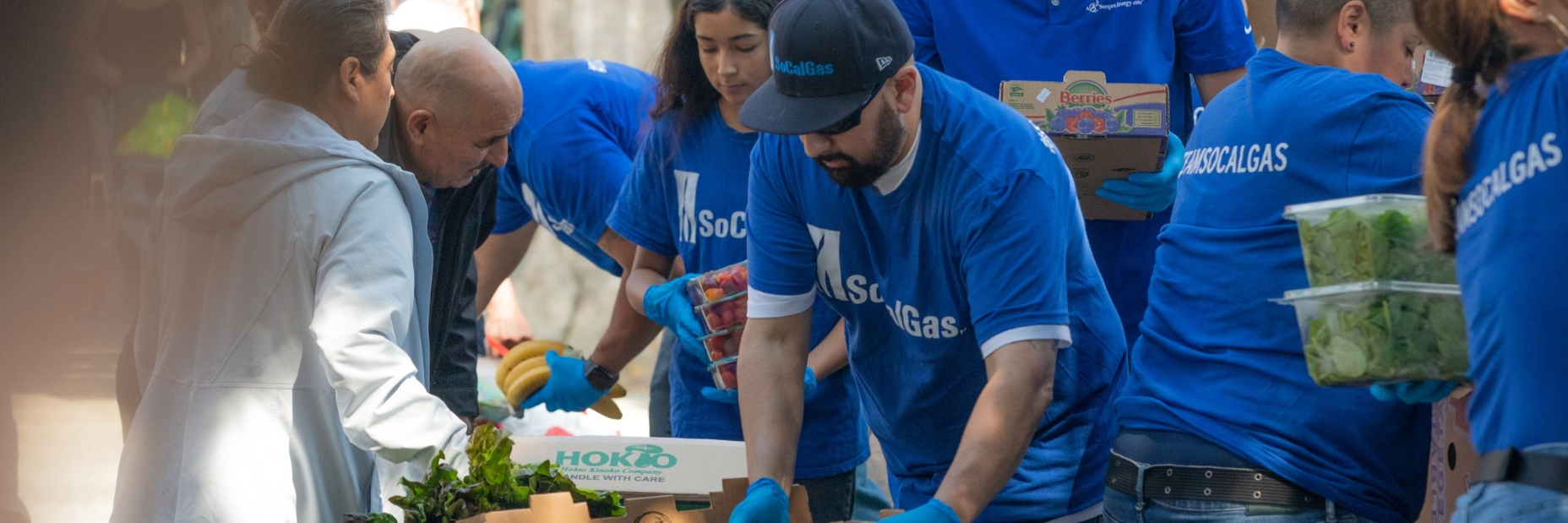 People organizing food at a food drive