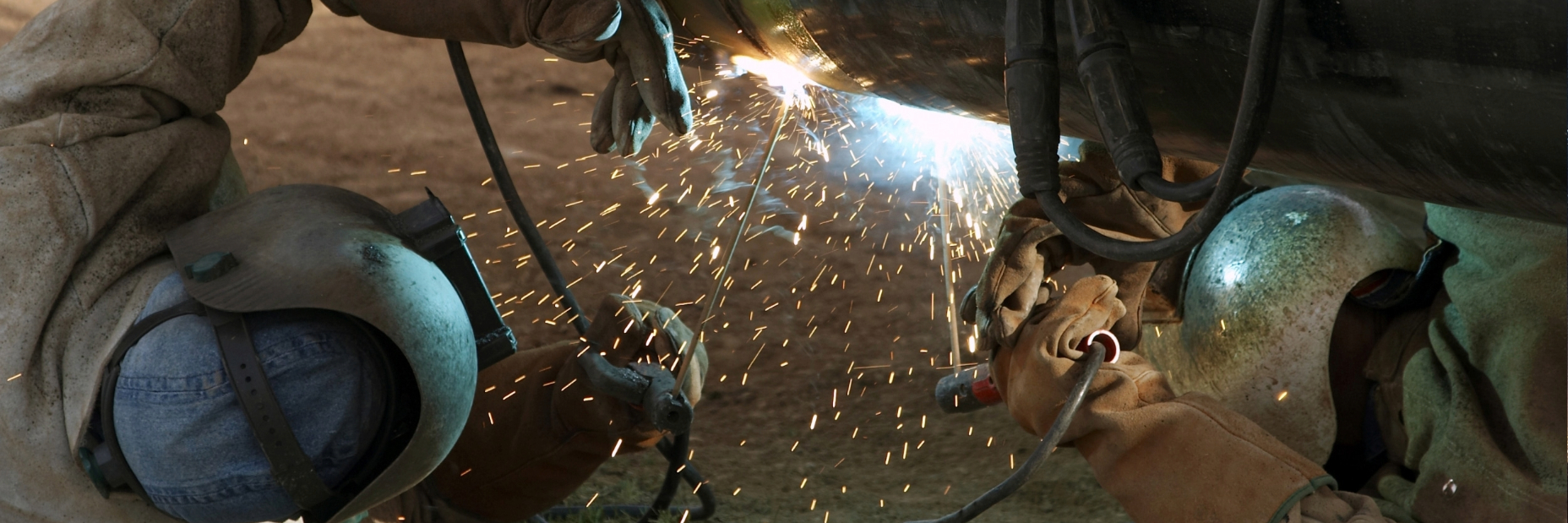 Workers welding