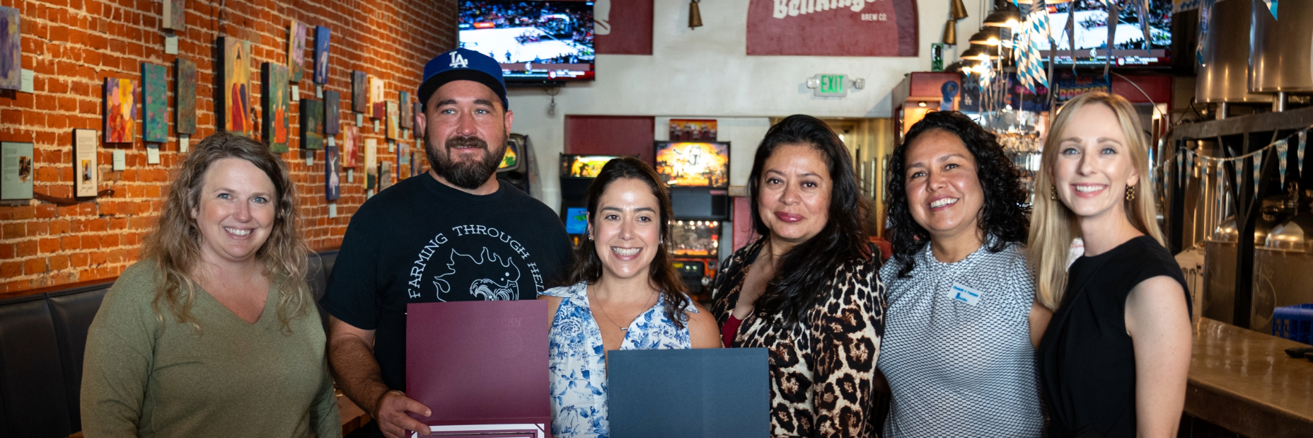 Group of people inside of a restaurant