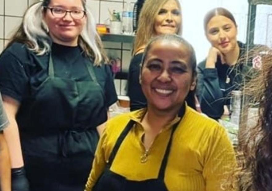 Pocha restaurant workers smiling